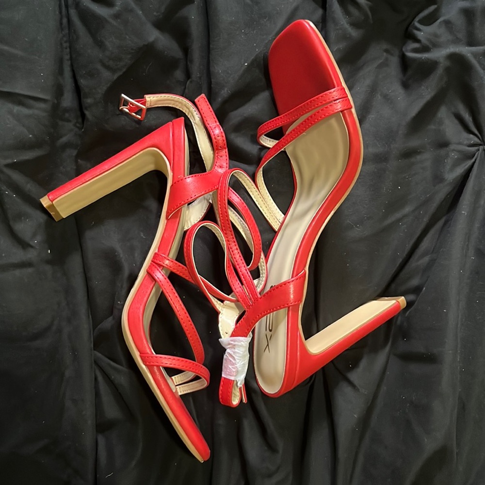 X2B red heels.